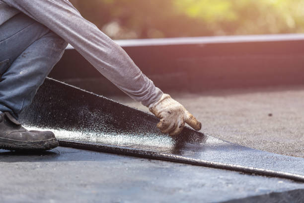 Professional Waterproofing technician working in Rush, NY